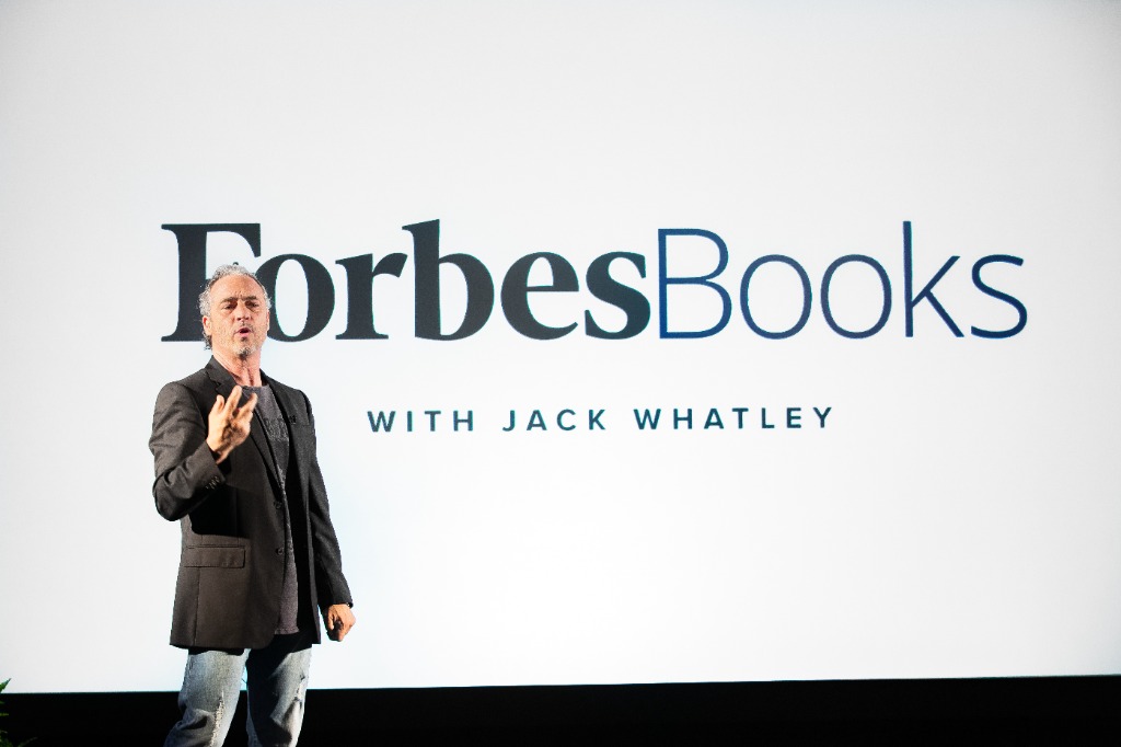 Jack Whatley delivering keynote at ForbesBooks Headquarters